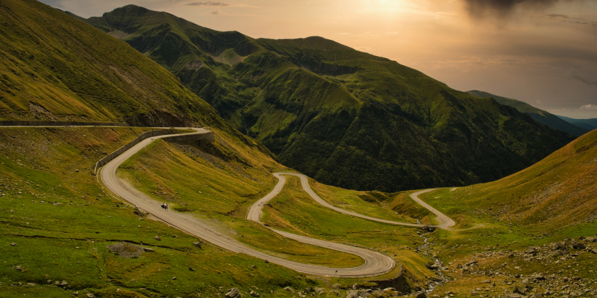 The Transfagarasan road - the best road in Romania - in the obscure light of the sunset.