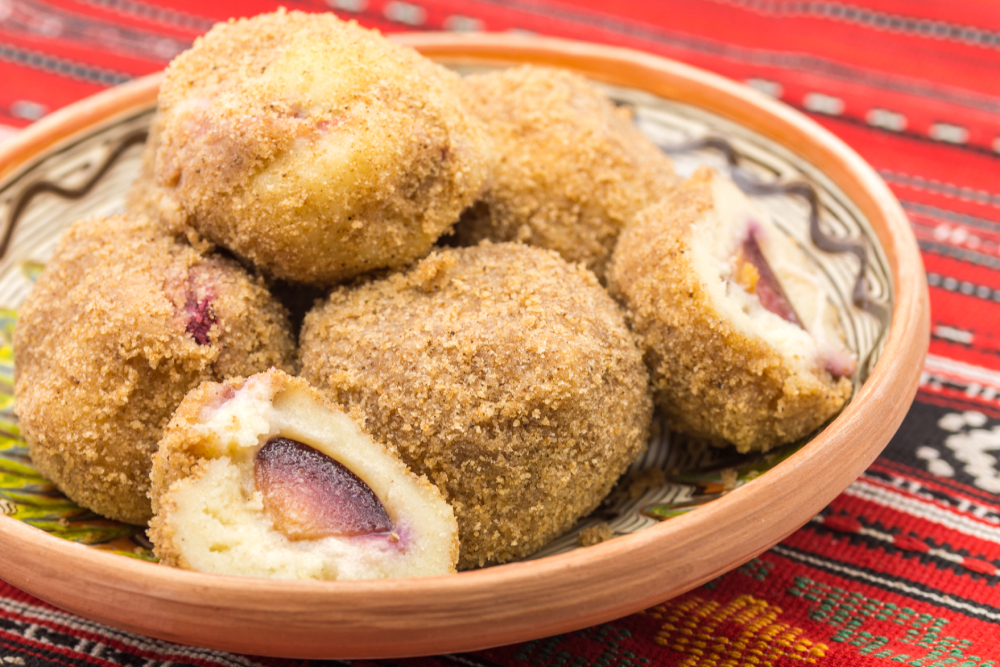 Galuste cu prune - a romanian traditional dessert. In English we can call it plum dumplings