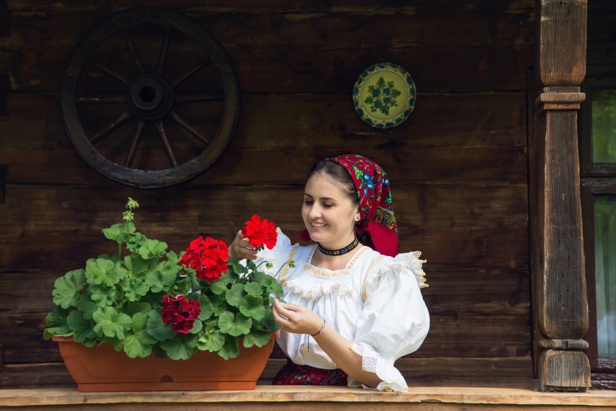 Romanian women near flowers