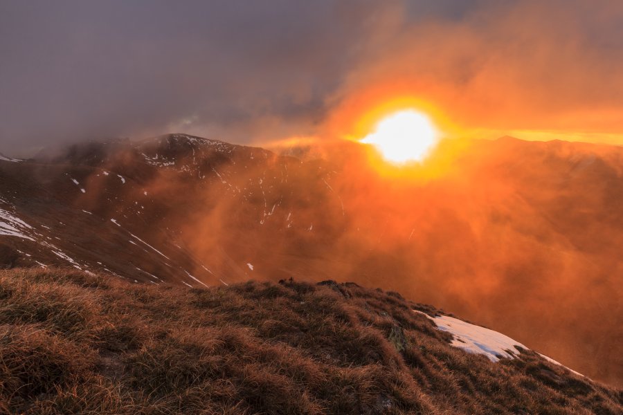 Fagaras Mountains during sunrise, in a beautiful orange light