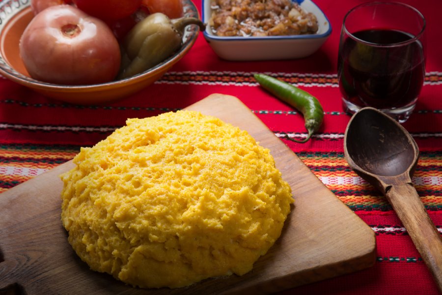 Mamaliga (or polenta) is a creamy, yellow romanian traditional food