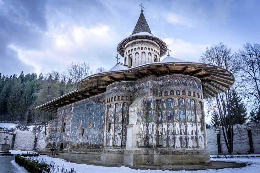 Voronet Monastery - Blue painting in the winter season, snow everywhere