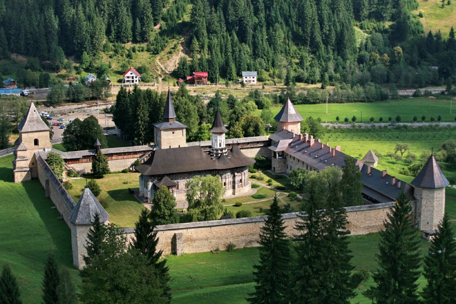 Sucevita Monastery in the summer season. All is green